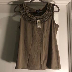Ann Taylor tank tan in color with ruffle layers around the neckline